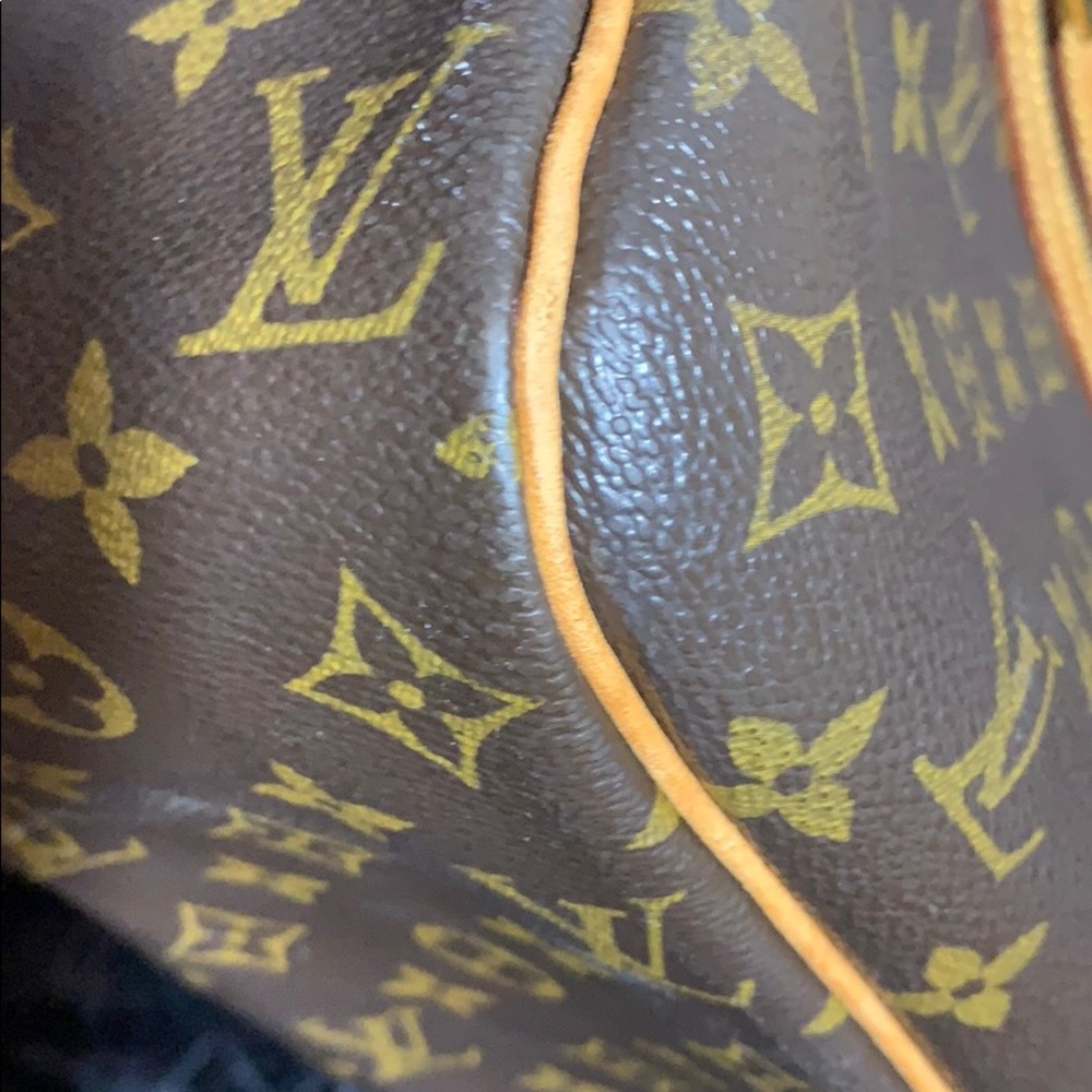 Authentic Louis Vuitton Cite GM - Picture 12 of 15